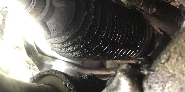 Why is my vehicle making a whining noise while turning? Image