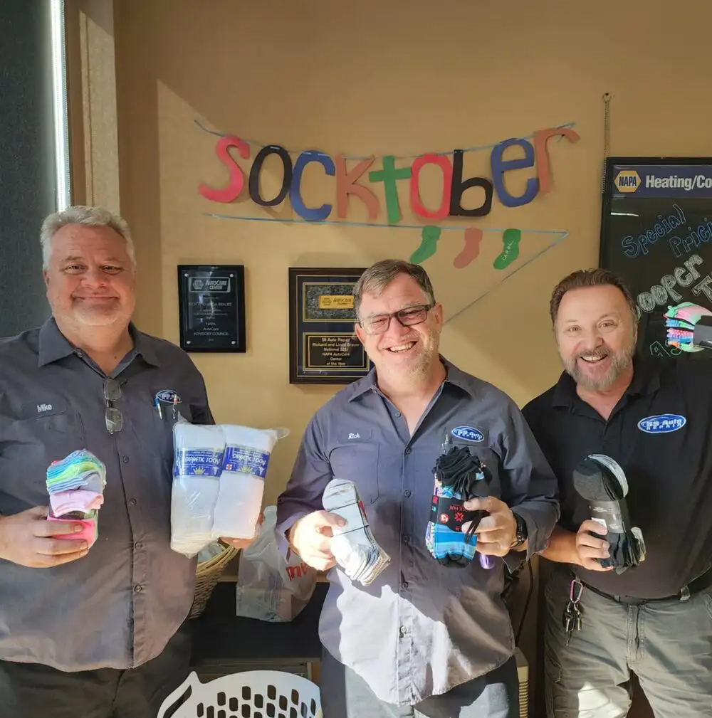 Socktober at 59 Auto Repair: Keeping Our Community Warm Image