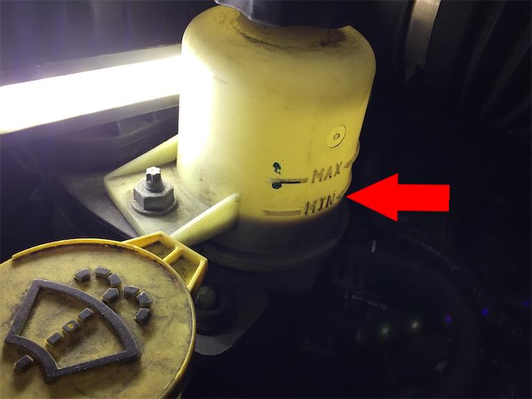 How do I check my power steering fluid? Image