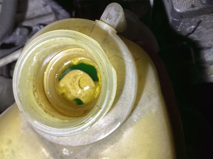What happens when engine oil gets in the coolant? Image