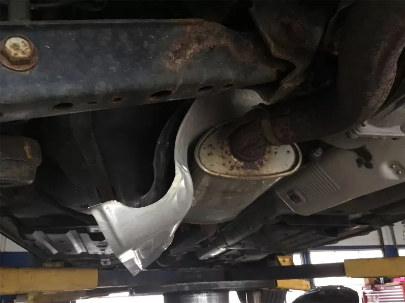 What is the plastic hanging under my car?  Image