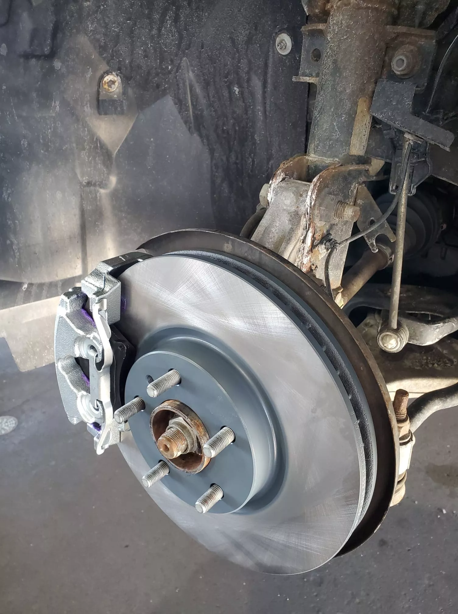 What does a repair technician look for when checking brakes? Image